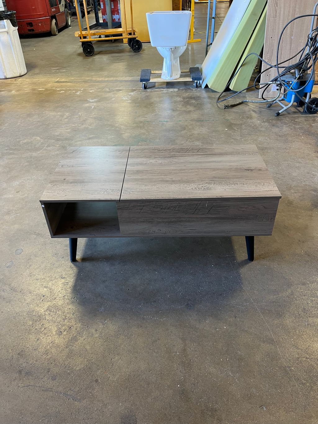 gray wood coffe table with inside storage